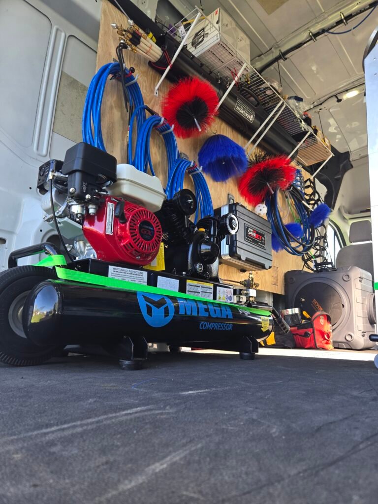 Various cleaning supplies and a commercial grade compressor 