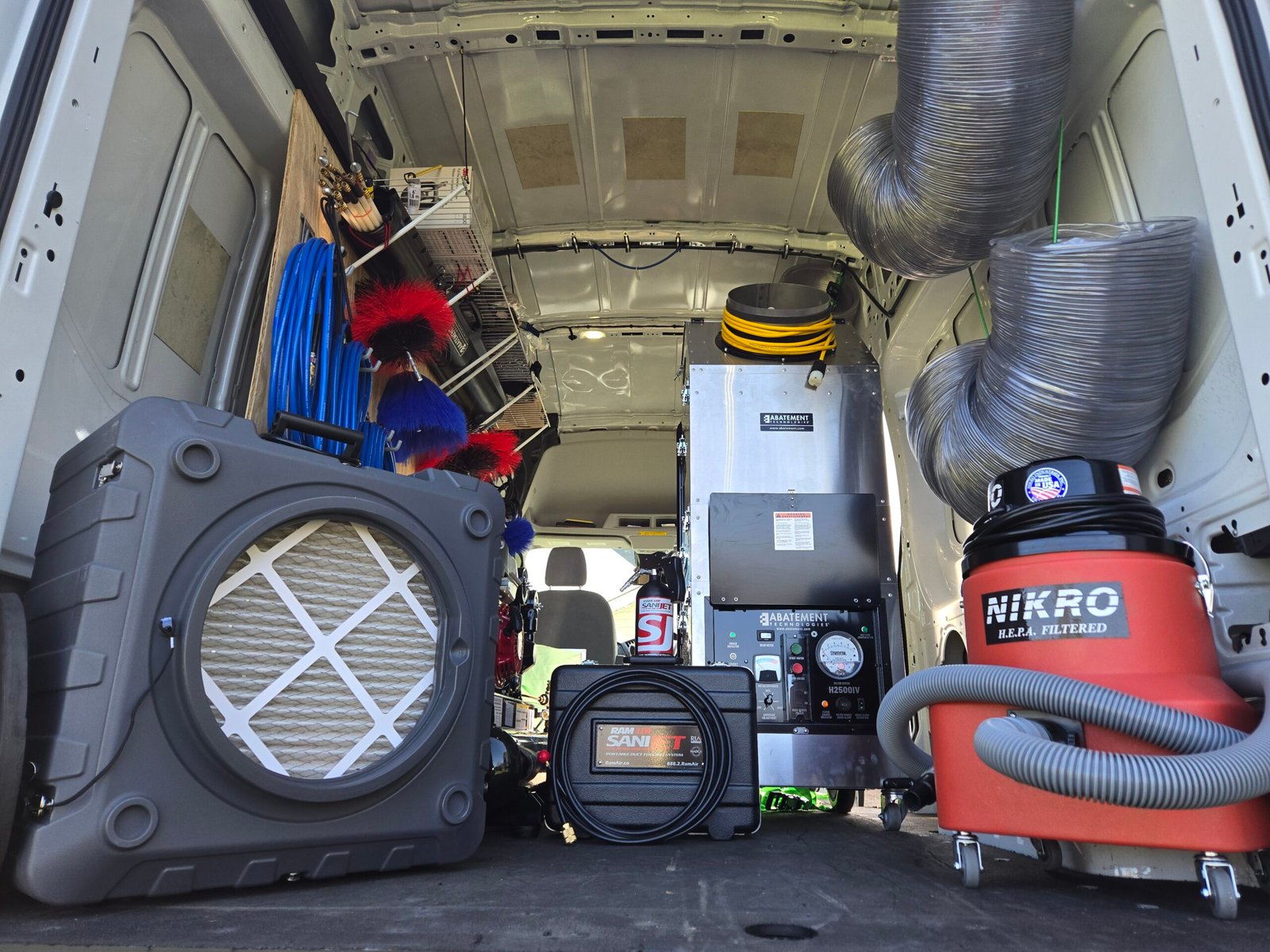 Various large commercial grade vacuum systems used for containment as well as various cleaning supplies